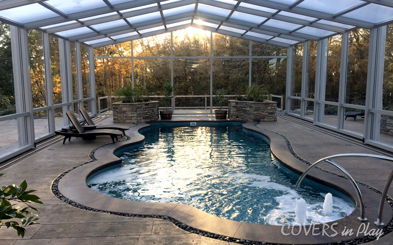 Interior view of swimming pool dome with water jets and waterfalls in Des Moines, IA, build by Covers in Play